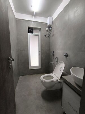 Bathroom in 3 BHK Apartment at Shreenathji Celestial Heights, Malad West – for Rent