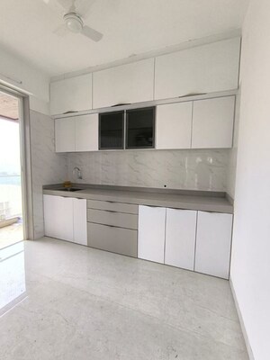 Kitchen in 3 BHK Apartment at Shreenathji Celestial Heights, Malad West – for Rent