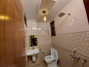 Bathroom in 3 BHK Builder Floor at Dwarka Mor – for Rent