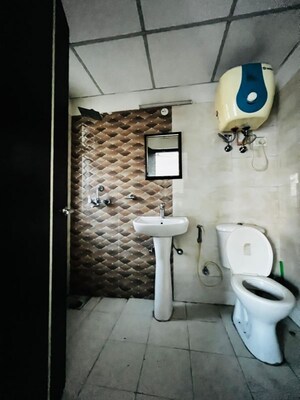 Bathroom in 2 BHK Apartment at Samridhi Grand Avenue, Tech Zone 4 Greater Noida – for Rent
