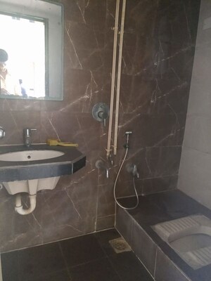 Bathroom in 1 BHK Apartment at Skyline Sparkle, Bhandup West – for Sale