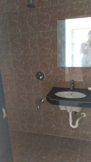 Bathroom in 1 BHK Apartment at Skyline Sparkle, Bhandup West – for Sale