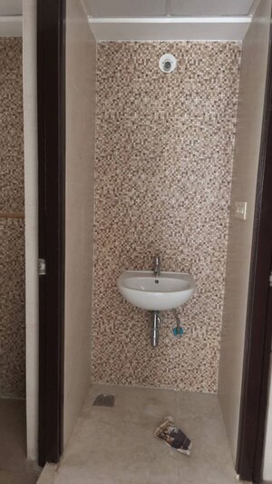 Bathroom in 1 BHK Apartment at Lodha Lakeshore Greens, Dombivli East – for Rent