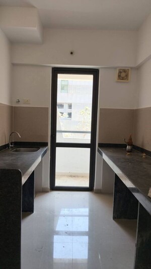 Kitchen in 1 BHK Apartment at Lodha Lakeshore Greens, Dombivli East – for Rent