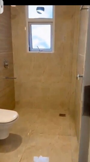Bathroom in 3 BHK Apartment at Omaxe The Palace, Gomti Nagar – for Rent