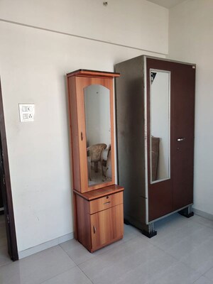 Room in 2 BHK Apartment at Bhandari 7 Plumeria Drive, Tathawade – for Rent