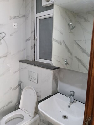 Bathroom in 3.5 BHK Builder Floor at Smart World Gems, Sector 89 – for Rent