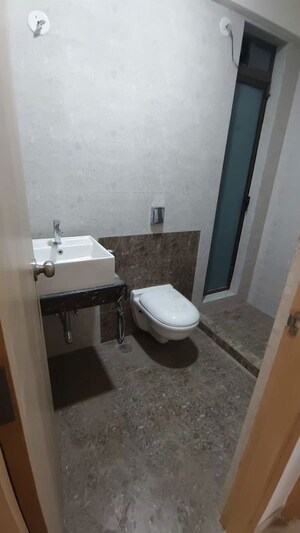 Bathroom in 2 BHK Apartment at Raj Infinia, Malad West – for Rent
