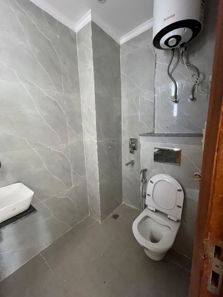 Bathroom, rajpur khurd extension 2 Bedroom 85 Sq.Yd. Builder Floor In Rajpur Khurd Extension Delhi 10164841