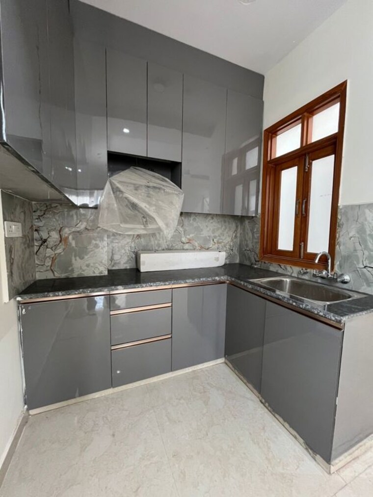 Kitchen, rajpur khurd extension 2 Bedroom 85 Sq.Yd. Builder Floor In Rajpur Khurd Extension Delhi 10164841