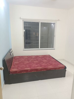 Bedroom in 2 BHK Apartment at Pimple Saudagar – for Rent