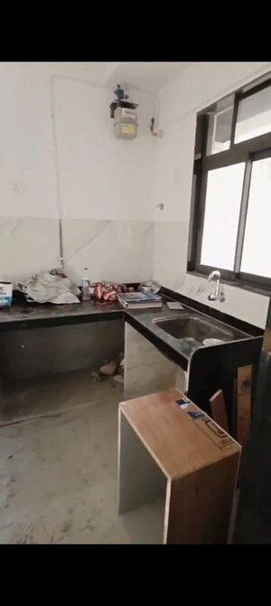 Kitchen in 2 BHK Apartment at Dev Leo Tower, Oshiwara – for Rent