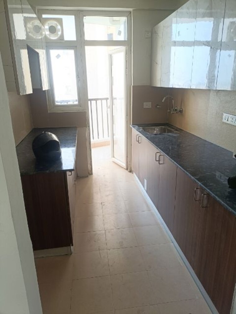 Kitchen, amrapali-heartbeat-city 2.5 Bedroom 1350 Sq.Ft. Apartment In Sector 107 Noida 10164931