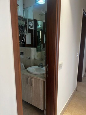 Bathroom in 4 BHK Builder Floor at Pamposh Enclave – for Sale