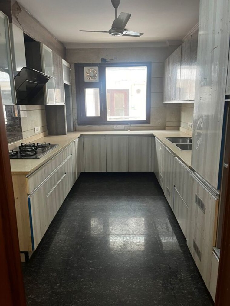 Kitchen, pamposh enclave 4 Bedroom 450 Sq.Yd. Builder Floor In Pamposh Enclave Delhi 10164969