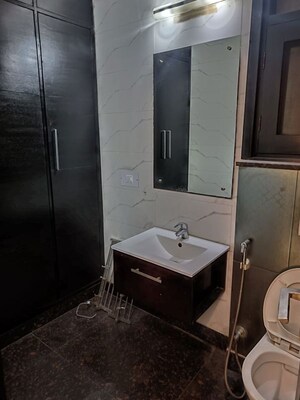Bathroom in 3 BHK Builder Floor at Kalkaji – for Rent