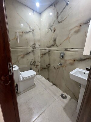 Bathroom in 3 BHK Builder Floor at Rajpur – for Sale