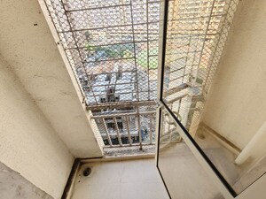 Balcony in 1 BHK Apartment at Seven Apna Ghar Phase 2 Plot B, Mira Road – for Rent