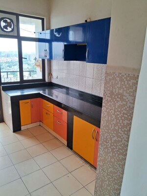 Kitchen in 4 BHK Apartment at AWHO Twin Towers PH4, Omega I Greater Noida – for Rent