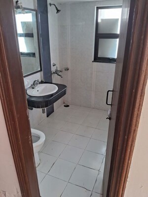 Bathroom in 4 BHK Apartment at AWHO Twin Towers PH4, Omega I Greater Noida – for Rent