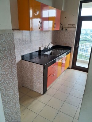 Kitchen in 4 BHK Apartment at AWHO Twin Towers PH4, Omega I Greater Noida – for Rent
