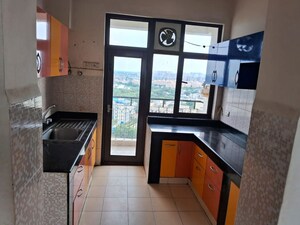 Kitchen in 4 BHK Apartment at AWHO Twin Towers PH4, Omega I Greater Noida – for Rent