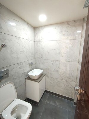 Bathroom in 4 BHK Apartment at Rohini Sector 9 – for Sale