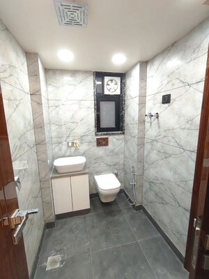 Bathroom in 4 BHK Apartment at Rohini Sector 9 – for Sale