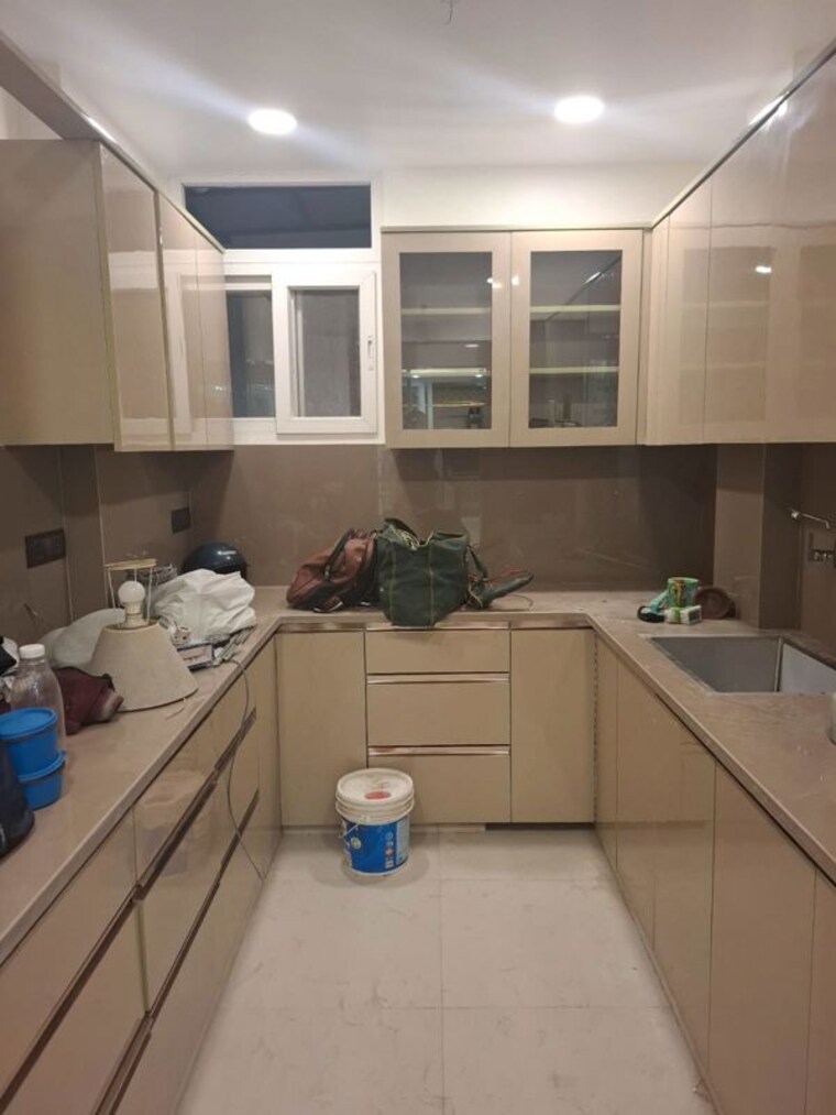 Kitchen, kailash colony 3 Bedroom 160 Sq.Yd. Builder Floor In Kailash Colony Delhi 10165336