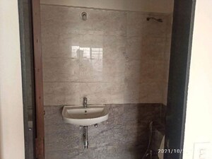 Bathroom in 2 BHK Apartment at Ayaan Society , Wagholi – for Rent