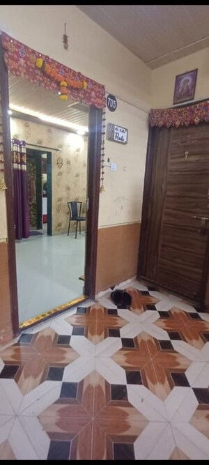 Bedroom in 1 BHK Apartment at Om Laxmi Vijay CHS, Dombivli West – for Sale