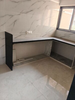 Kitchen in 2 BHK Apartment at Yash Ina Apartments, Goregaon West – for Rent