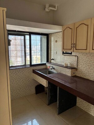 Kitchen in 2 BHK Apartment at Dynamic Panchsheel Heights, Kandivali West – for Sale