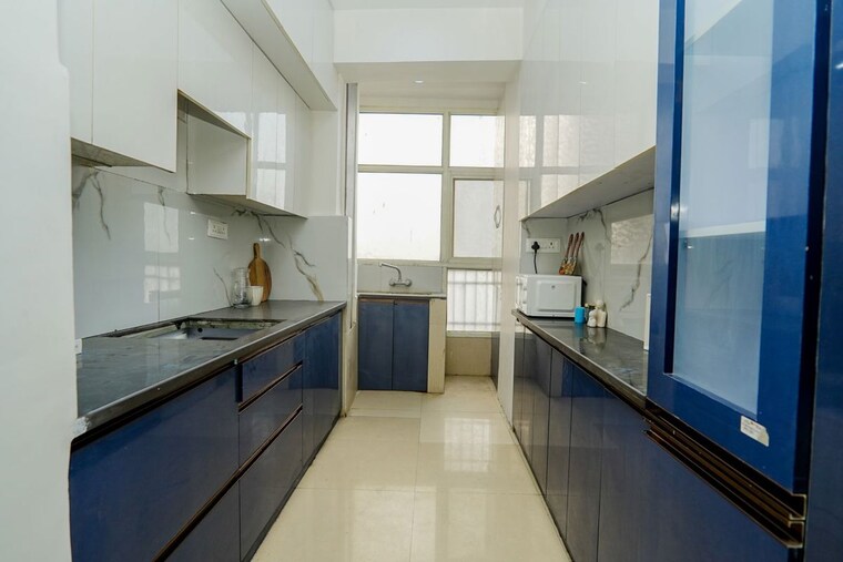 Kitchen, supertech-cape-town 2.5 Bedroom 1150 Sq.Ft. Apartment In Sector 74 Noida 10165402