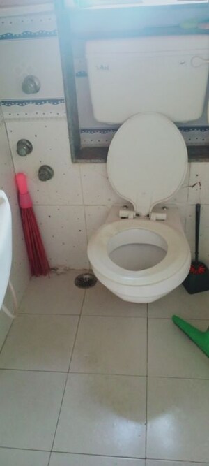 Bathroom in 2 BHK Apartment at Takshila CHS, Andheri East – for Rent