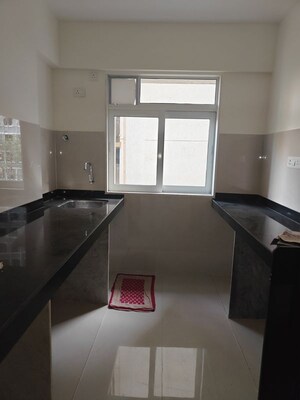 Kitchen in 2 BHK Apartment at Veer Signature, Andheri West – for Sale