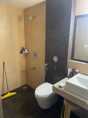 Bathroom in 1 BHK Apartment at Unnati Woods CHS, Kasarvadavali – for Sale