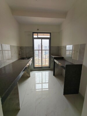 Kitchen in 1 BHK Apartment at Metropolis Bayside, Kasarvadavali – for Rent