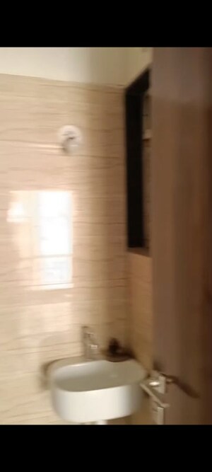 Bathroom in 1 BHK Apartment at Bhagwati Belmont, Haware City – for Rent