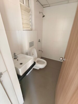 Bathroom in 1.5 BHK Apartment at Godrej Emerald, Ghodbunder Road – for Rent