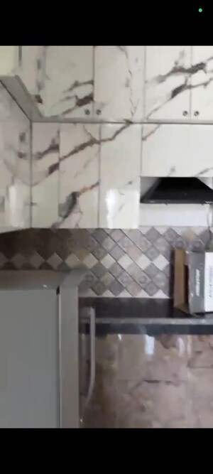 Kitchen in 2 BHK Apartment at Signature The Millennia 3, Sector 37d – for Rent