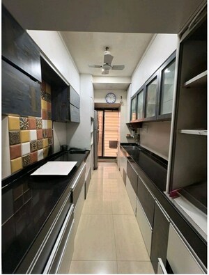 Kitchen in 3 BHK Apartment at Lalani Residency, Kavesar – for Rent
