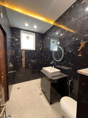 Bathroom in 3 BHK Builder Floor at Nehru Enclave – for Sale