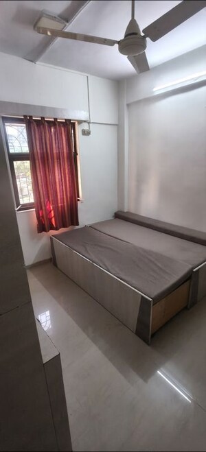 Bedroom in 1 BHK Apartment at Evershine CHS Malad, Malad West – for Rent