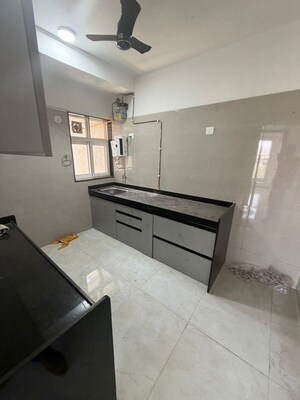 Kitchen in 2 BHK Apartment at Vaibhavlaxmi Queens Glory, Chembur – for Rent