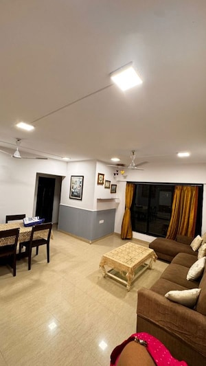 Living Room in 2 BHK Apartment at Kiran Towers, Malad West – for Rent