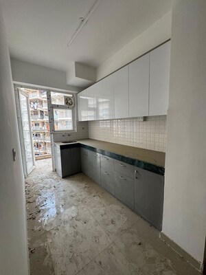 Kitchen in 2 BHK Apartment at Shree Vardhman Green Court, Sector 90 – for Rent