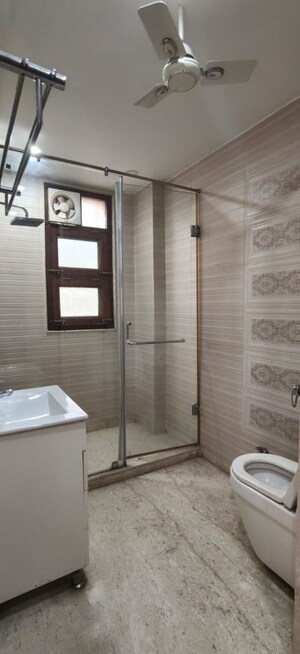 Bathroom in 4 BHK Builder Floor at Kailash Colony – for Rent