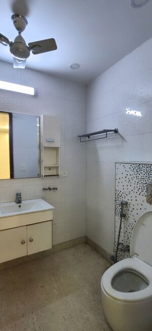 Bathroom in 4 BHK Builder Floor at Kailash Colony – for Rent