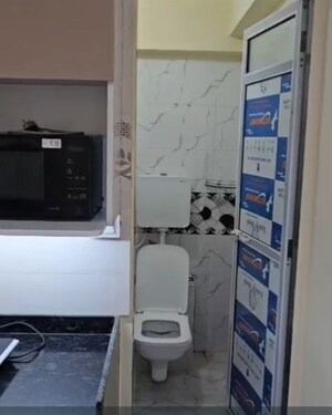 Bathroom in 1 BHK Apartment at Mohid Swiz Heights, Andheri West – for Rent